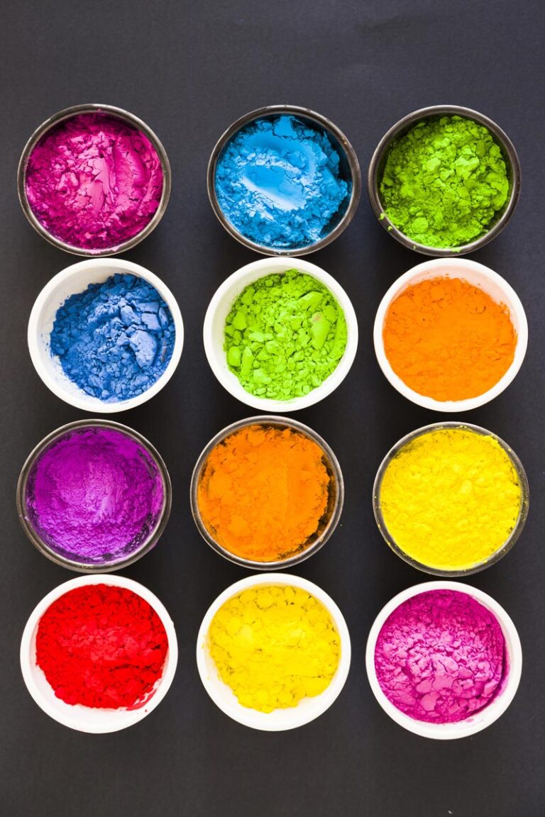 various colorful holi color powder bowls