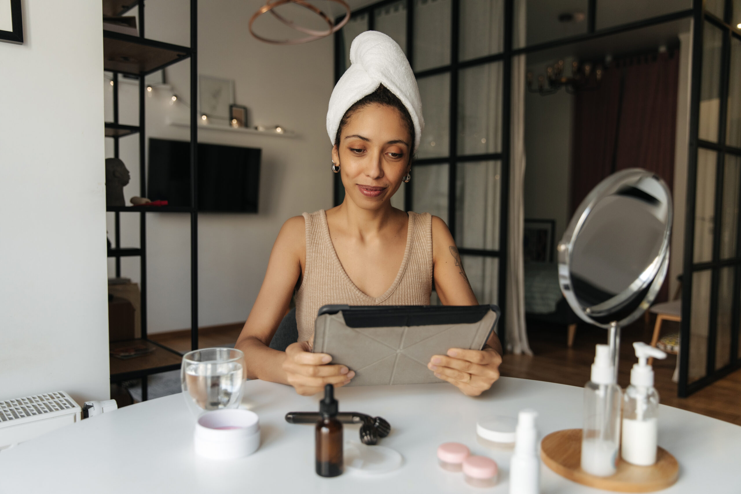 view beautiful black woman watching laptop